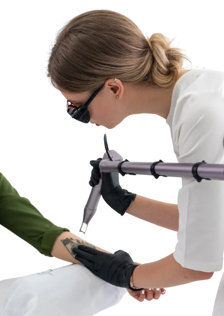 Technician using the PicoWay laser to remove a forearm tattoo